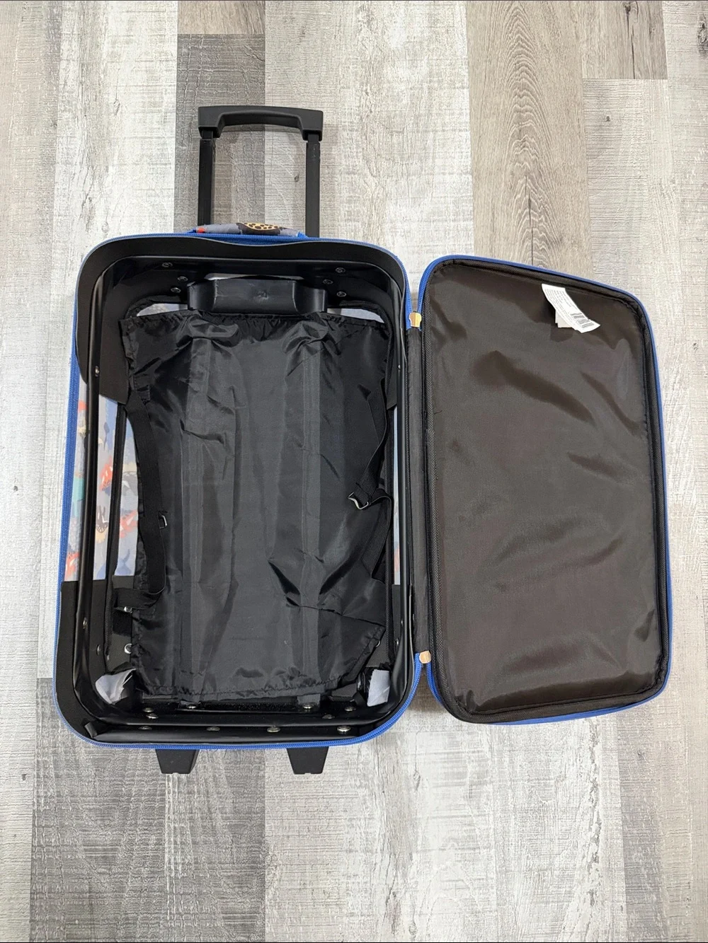 Amazon Kids Rolling Luggage with Red, Blue, Teal & Tan Dinosaur Print